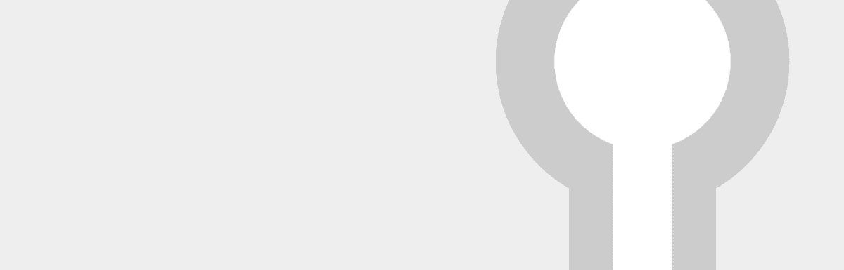 Imagen de cabecera del plugin Two-Factor de WordPress.org que muestra un primer plano de una tecla en escala de grises sobre un fondo gris claro.